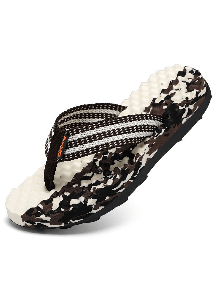 Stylish non-slip massage slippers with striped strap and camo pattern, perfect for beachwear. Model SF1096. Rubber soles and EVA insoles.